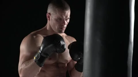 Boxer punching bag, slow motion Stock Footage 11524280