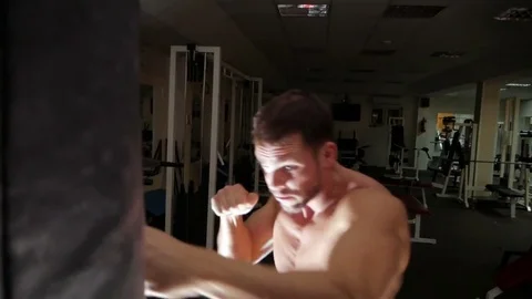 Boxer pushes punching pear Stock Footage 75807483