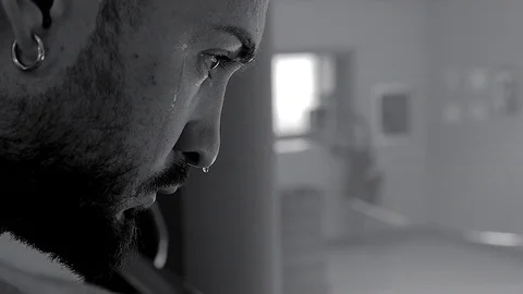 Boxer in ring in thinking tired sweating closeup black and white Stock Footage 81447869