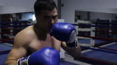 Boxer in slow motion in your face Stock Footage 24642350