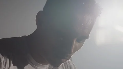 Boxer standing in boxing ring after work out in foggy gym Stock Footage 104569201