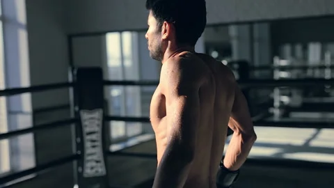 Boxer standing at the ring. Steadycam shot. Stock Footage 98678568