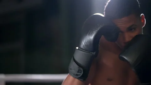 Boxer starts training with shadowboxing Stock Footage 197382164
