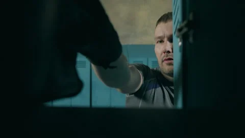 Boxer takes gloves out of locker in gym Stock Footage 242873011