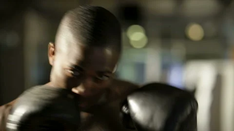 Boxer throwing punch Stock Footage 1094683