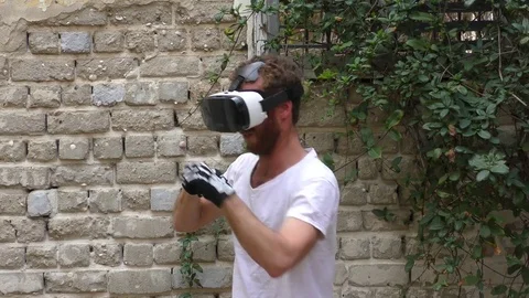 A boxer throwing punches during virtual augmented reality game  Video stock 75288495