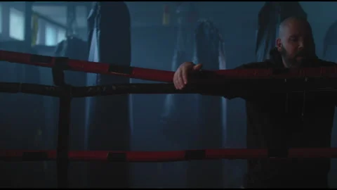 Boxer trainer yelling at boxer in ring Stock Footage 275089083