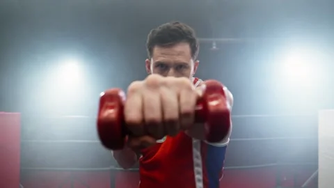 Boxer training boxing move with dumbbells in hands. Fight sport concept. Stock Footage 274385987
