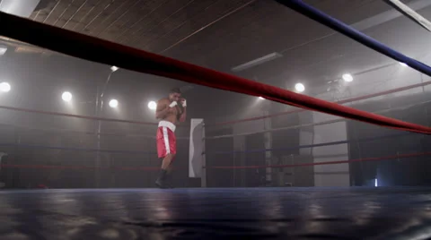 Boxer training in boxing ring Stock Footage 32735620