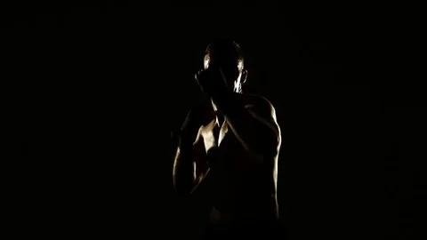 Boxer training in a gym, dramatic lighting Stock Footage 75785048