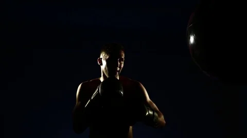 Boxer training in a gym, dramatic lighting Stock Footage 75786219
