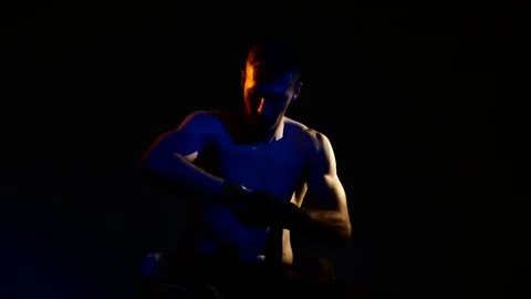 Boxer training in a gym, dramatic lighting Stock Footage 75805350