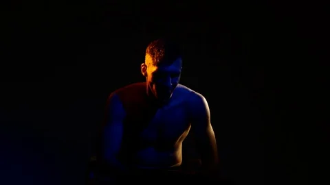 Boxer training in a gym, dramatic lighting Stock Footage 75805364