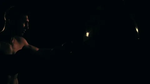 Boxer training in a gym, dramatic lighting Stock Footage 75812813