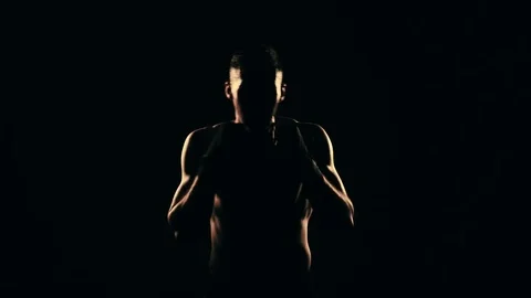 Boxer training in a gym, dramatic lighting Stock Footage 75812991