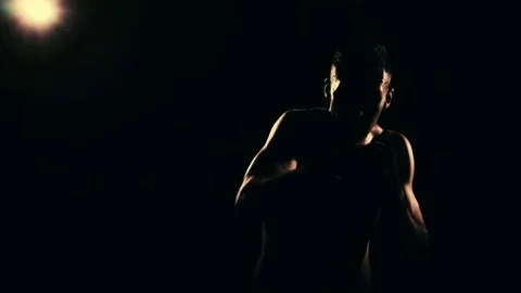 Boxer training in a gym, dramatic lighting Stock Footage 75813046