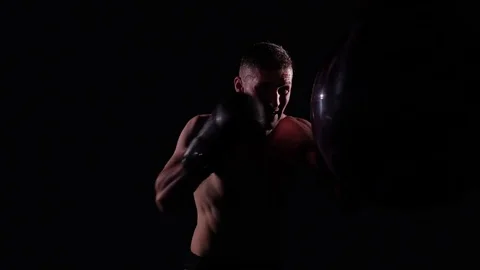 Boxer training in a gym, dramatic lighting Stock Footage 75826341