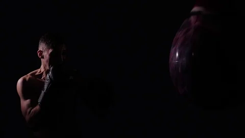 Boxer training in a gym, dramatic lighting Stock Footage 75826675