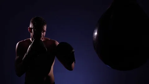 Boxer training in a gym, dramatic lighting Stock Footage 75827414