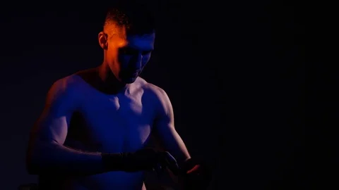 Boxer training in a gym, dramatic lighting Stock Footage 75828132