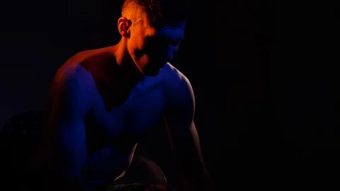 Boxer training in a gym, dramatic lighting Stock Footage 75828221