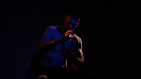 Boxer training in a gym, dramatic lighting Stock Footage 75828399