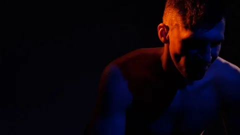 Boxer training in a gym, dramatic lighting Stock Footage 75828443