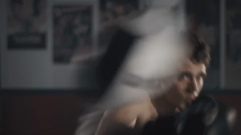 Boxer Training With The Striking Punching Bag In The Gym Stock Footage 105440593