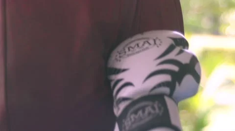 Boxer trains on punching bag Stock Footage 63077859