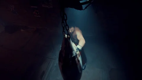 Boxer Trains on A Punching Bag Stock Footage 128265708