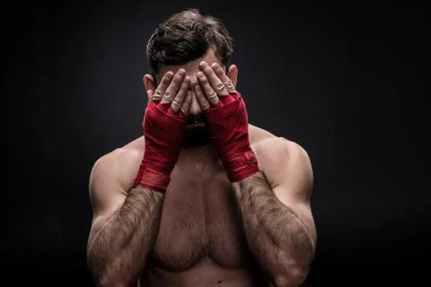 Boxer with wrapping hands Stock Photos