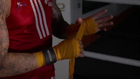 Boxer wrapping his hands Stock Footage 165449336