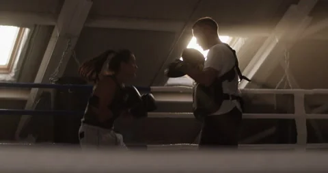 Boxers practicing in attic gym Stock Footage 228439105