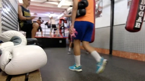 Boxers practicing punch strikes in the training hall Stock Footage 78531501