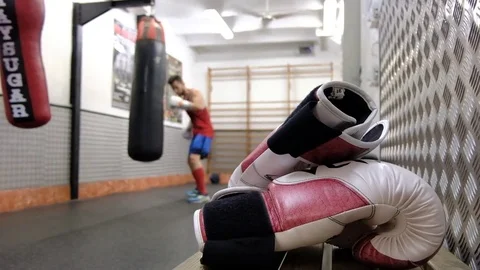 Boxers practicing punch strikes in the training hall Stock Footage 78531506
