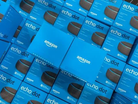Boxes of Amazon Echo Dot virtural assistants for sale in a display bin in a B Stock Photos