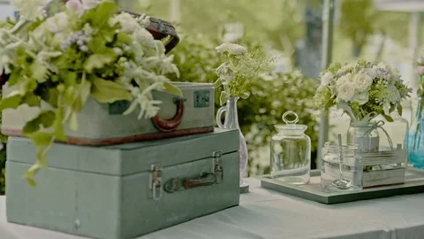 Boxes and flowers as wedding decorations.  Stock Footage 90976794