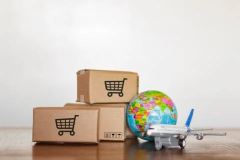 Boxes and plane with planet earth. Shopping worldwide concept Stock Photos