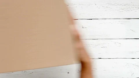 Boxes being placed on the table and taken away Stock-Footage 94229095