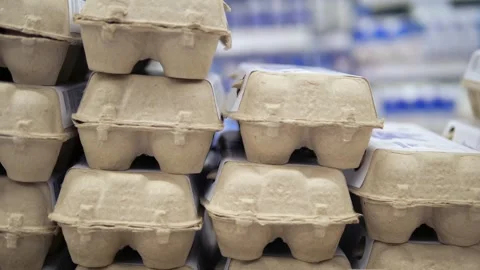 Boxes of chicken eggs standing in a row and on top of each other Stock-Footage 312169385