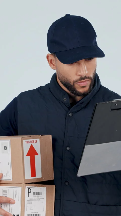 Boxes, clipboard and face with delivery man in studio for signature on a white Stock Footage 336840084