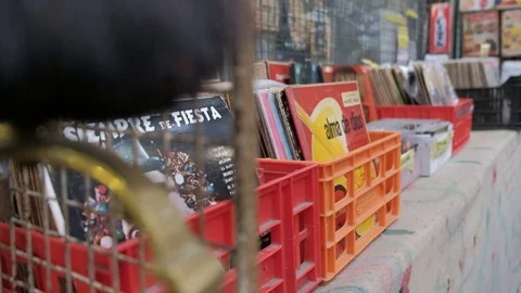 Boxes containing old vinyl records and cds on a flea store in San Telmo Fair Stock-Footage 122584422