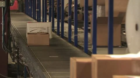 Boxes On a Converyer Belt 스톡 동영상 18963384