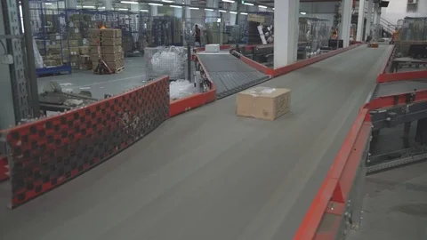 Boxes on a Conveyor Belt 스톡 동영상 119200466