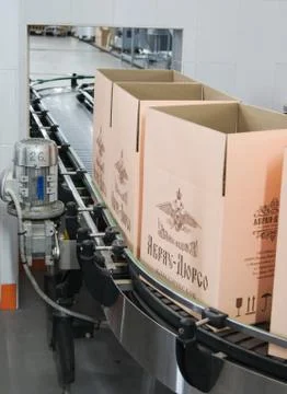 Boxes on a conveyor belt. Photos