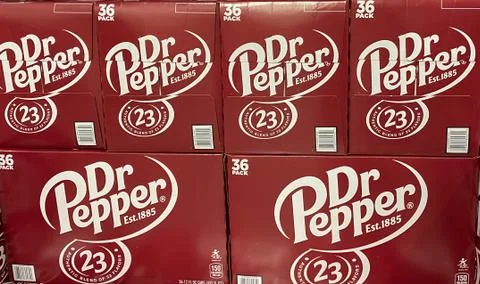 Boxes of Dr Pepper stacked up in the Costco store Stock Photos