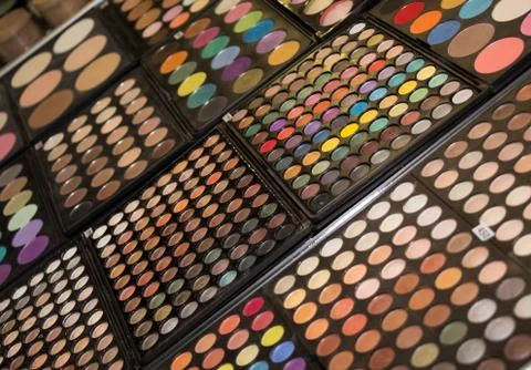 Boxes with eyeshadows Stock Photos