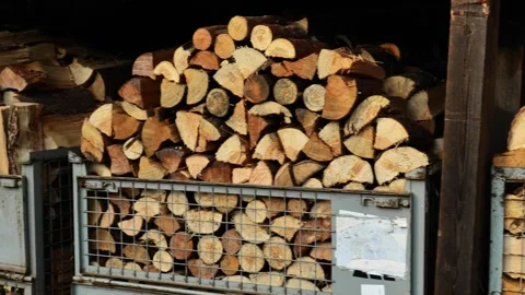Boxes of firewood. solid fuel. Firewood in metal boxes. Stock Footage 305402567
