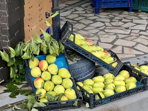 Boxes full of pears for sale on the local market Stock Photos