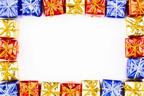 Boxes with gifts on a white background with copy space for text. Golden box Stock Photos
